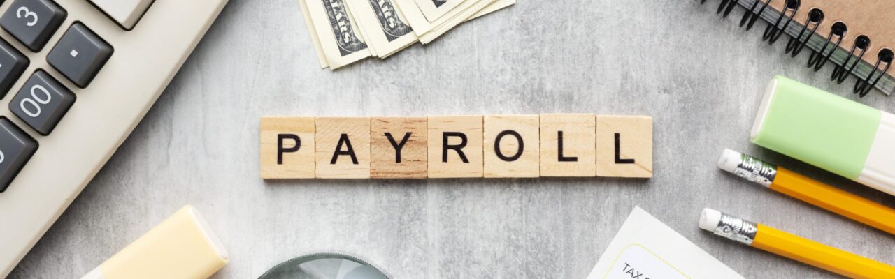 top-view-payroll-concept-with-items